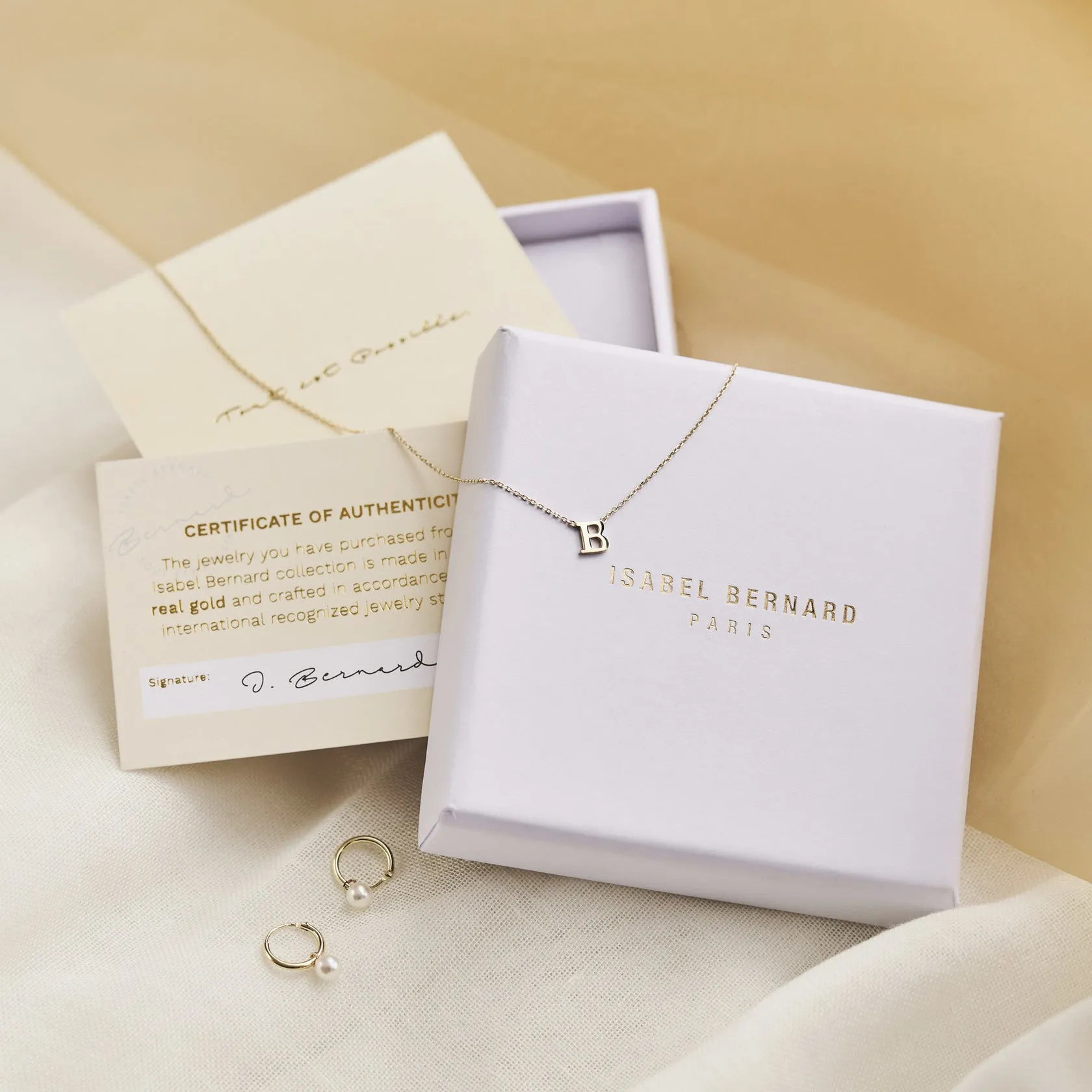 La Concorde Amore 14 karat rose gold ear studs with heart